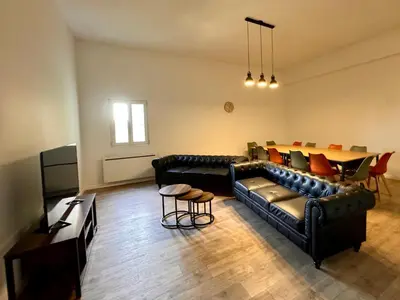 Coin salon dans l'établissement Appartement Jéroboam