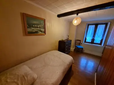 Un ou plusieurs lits dans un hébergement de l'établissement La Petite Maison Pa'Meuse