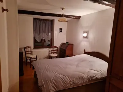 Un ou plusieurs lits dans un hébergement de l'établissement La Petite Maison Pa'Meuse