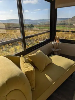 Coin salon dans l'établissement Maison Chez Papy Chapeau 4 étoiles