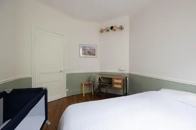 Un ou plusieurs lits dans un hébergement de l'établissement Appart 2 chambres I charmant & cosy I hyper-centre