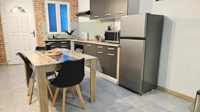 Cuisine ou kitchenette dans l'établissement À la belle étoile