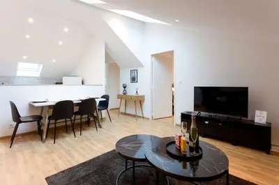 Télévision ou salle de divertissement dans l'établissement Opus Reims