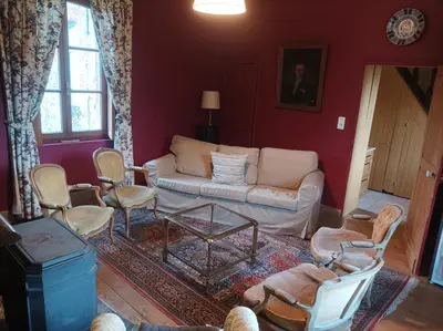 Coin salon dans l'établissement Château d'Hugémont- aile du Parc