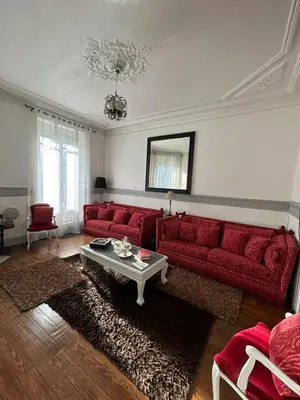Coin salon dans l'établissement Maison Charmante
