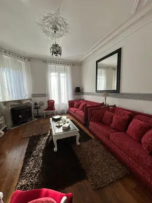 Coin salon dans l'établissement Maison Charmante
