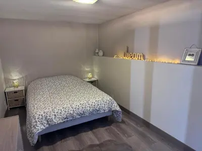 Un ou plusieurs lits dans un hébergement de l'établissement Gîte familial dans le vignoble champenois