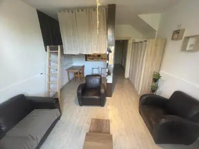 Coin salon dans l'établissement T1 Proche centre et cité Tirlet