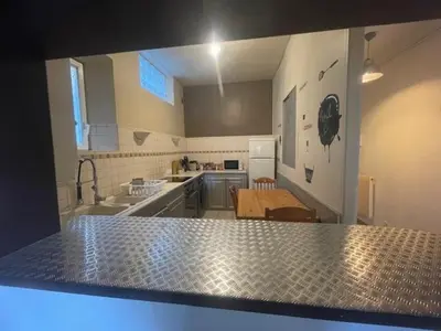 Cuisine ou kitchenette dans l'établissement T1 Proche centre et cité Tirlet