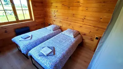 Un ou plusieurs lits dans un hébergement de l'établissement Le chalet de la presle