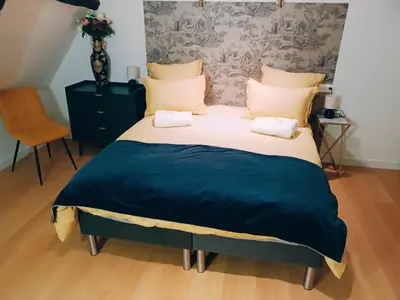 Un ou plusieurs lits dans un hébergement de l'établissement Château Compiegne Duplex et parking