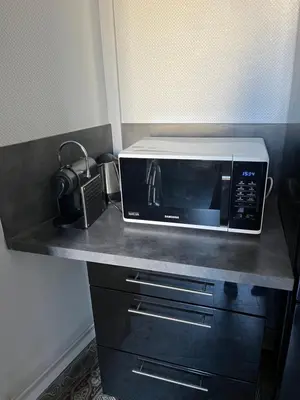 Cuisine ou kitchenette dans l'établissement Au Forum, Hypercentre Reims