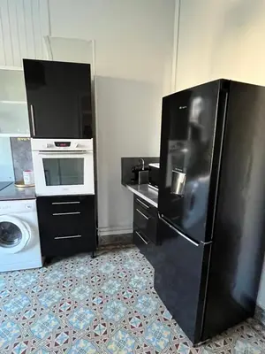 Cuisine ou kitchenette dans l'établissement Au Forum, Hypercentre Reims