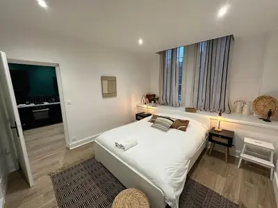 Un ou plusieurs lits dans un hébergement de l'établissement Santa Fe, appartement neuf proche du centre-ville