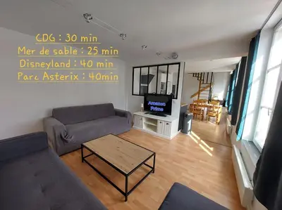 Télévision ou salle de divertissement dans l'établissement Appartement en centre de village