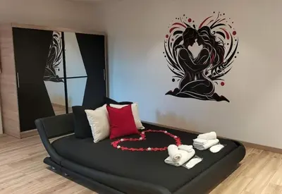 Coin salon dans l'établissement La Suite Romantique