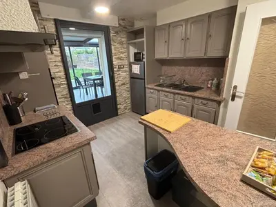 Cuisine ou kitchenette dans l'établissement Gîte Cosy avec Jardin&Garage privé 10min de Reims