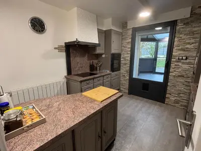 Cuisine ou kitchenette dans l'établissement Gîte Cosy avec Jardin&Garage privé 10min de Reims