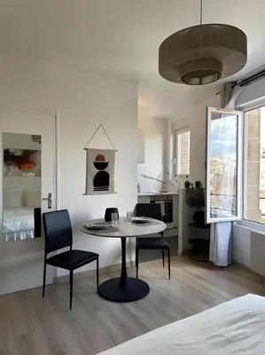 Un ou plusieurs lits dans un hébergement de l'établissement L'Appartement du Forum - Reims centre Cathédrale