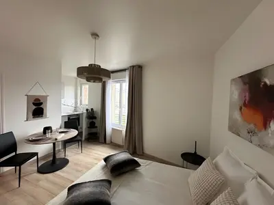 Coin salon dans l'établissement L'Appartement du Forum - Reims centre Cathédrale