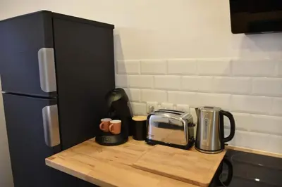 Cuisine ou kitchenette dans l'établissement La Balneo dans la Jungle