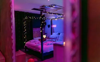 Un ou plusieurs lits dans un hébergement de l'établissement Escapade Romantique avec Champagne offert