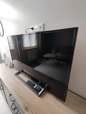 Télévision ou salle de divertissement dans l'établissement Maison Montebello