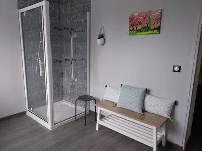Coin salon dans l'établissement La Ferme aux Charmes