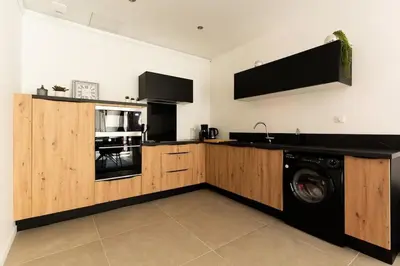 Cuisine ou kitchenette dans l'établissement La Royale Room
