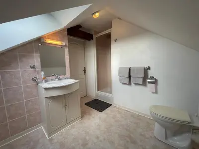 Salle de bains dans l'établissement Voyelles