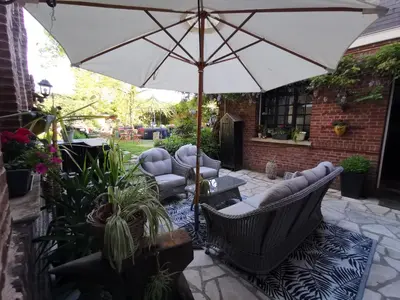 Coin salon dans l'établissement La maison du bonheur