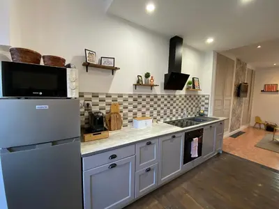 Cuisine ou kitchenette dans l'établissement Maison IDEM