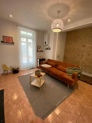 Coin salon dans l'établissement Maison IDEM