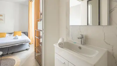 Un ou plusieurs lits dans un hébergement de l'établissement Sunshine - Appartement neuf - parking
