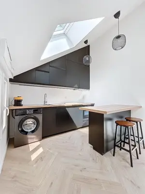 Cuisine ou kitchenette dans l'établissement Petit Loft centre-ville