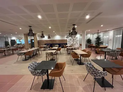 Restaurant ou autre lieu de restauration dans l'établissement Résidence Montana Reims Tinqueux