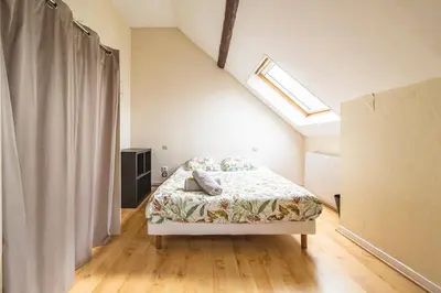 Un ou plusieurs lits dans un hébergement de l'établissement Grand appartement Reims gare centre 4 chambres