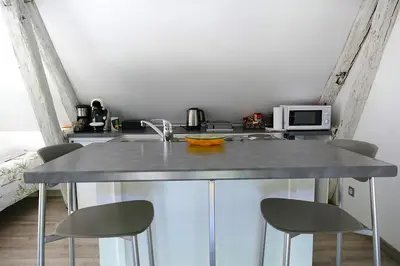 Cuisine ou kitchenette dans l'établissement Le Lido