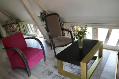 Coin salon dans l'établissement Le Lido