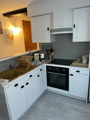 Cuisine ou kitchenette dans l'établissement Appartement centre ville proche Roissy CDG