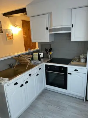 Cuisine ou kitchenette dans l'établissement Appartement centre ville proche Roissy CDG