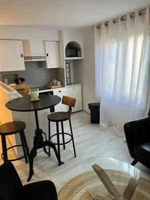 Cuisine ou kitchenette dans l'établissement Appartement centre ville proche Roissy CDG
