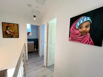 Télévision ou salle de divertissement dans l'établissement Charmant triplex, near Disney