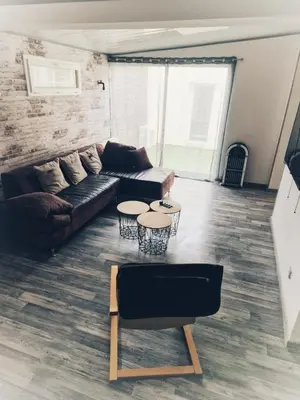 Coin salon dans l'établissement chalonnaise house 120m2