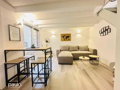 Coin salon dans l'établissement L'Atelier Médiéval