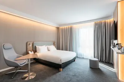 Un ou plusieurs lits dans un hébergement de l'établissement Holiday Inn Express & Suites Reims - Rives de Vesle by IHG