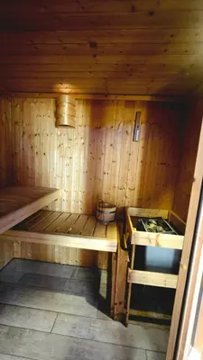 Un ou plusieurs lits dans un hébergement de l'établissement LÉchappée ZAisne jacuzzi et sauna