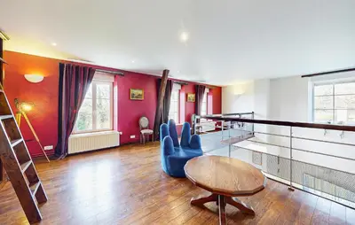 Coin salon dans l'établissement Stunning Home In Flaignes-Havys