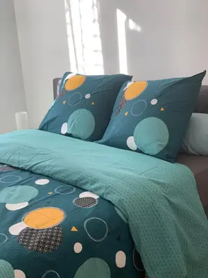 Un ou plusieurs lits dans un hébergement de l'établissement Chambres ou Appartement Cosy