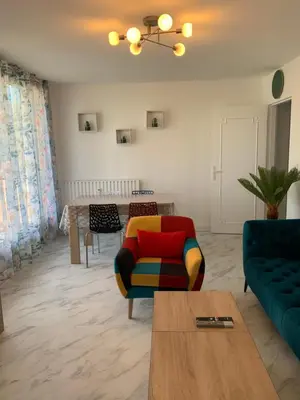 Coin salon dans l'établissement Chambres ou Appartement Cosy